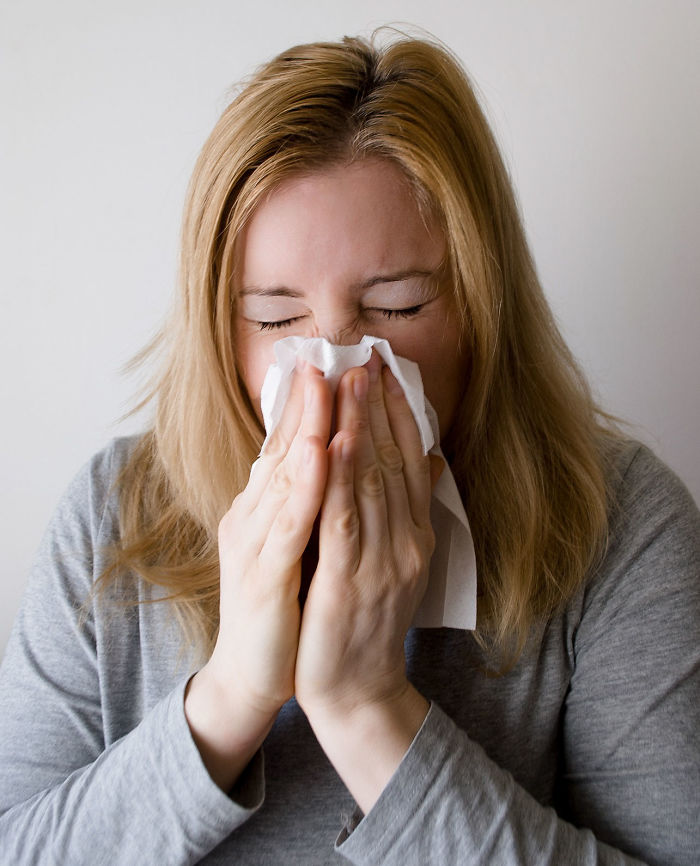 Stop a sneeze in its tracks by pressing down on the area right above your upper lip.