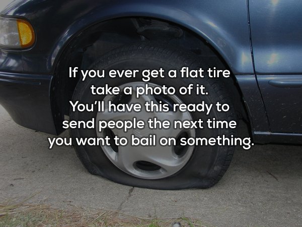 car with flat tire - If you ever get a flat tire take a photo of it. You'll have this ready to send people the next time you want to bail on something.