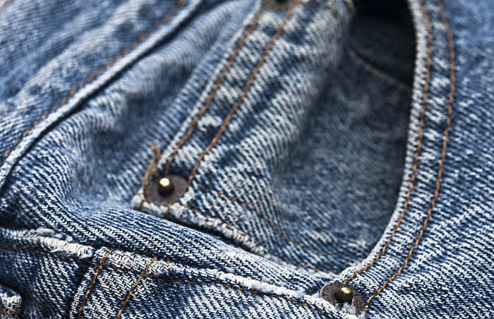 A teeny-tiny pocket that's seemingly pointless. If you’re wearing a good ol’ pair of jeans, chances are it has a teeny-tiny pocket above the regular pockets on the front. The same place where you get your thumb stuck now and then. It was originally meant to tuck in a hand watch. Levi’s points out it has served more purposes throughout the years, like storing coins, matches, and tickets.