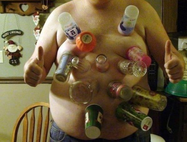 fat guy stuck bottles to his chest