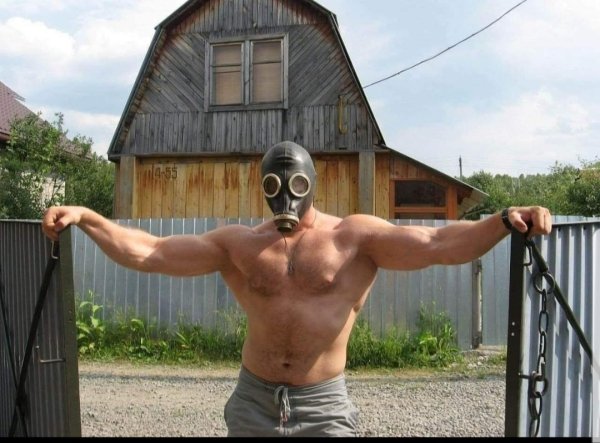 buff guy in gas mask