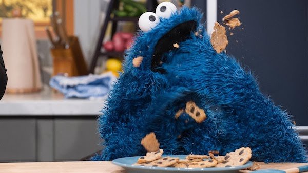 All the Sesame Street Muppets have four fingers, except Cookie Monster. He has five fingers.
