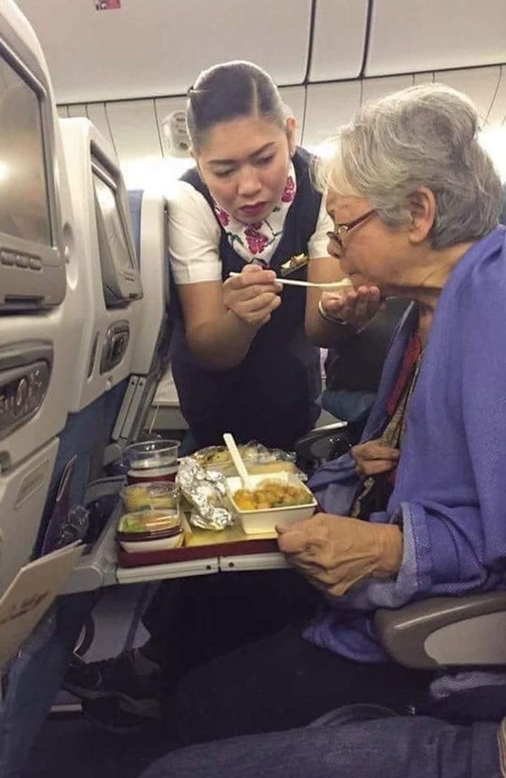 flight attendant who spoon feed lady