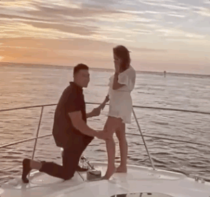 guy losing engagement ring on a boat gif