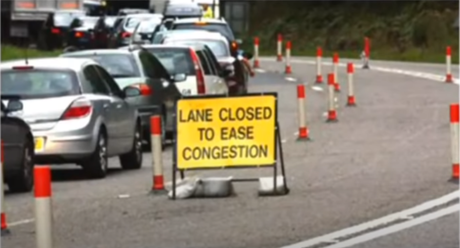 funny road signs - Lane Closed To Ease Congestion