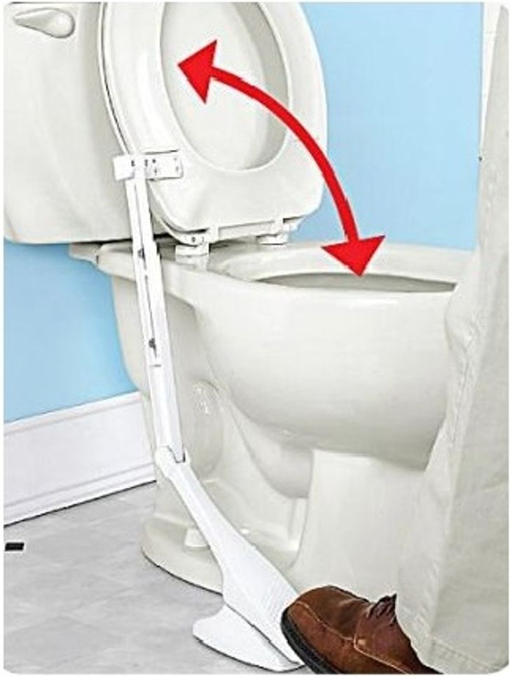 A hands-free toilet seat lifter