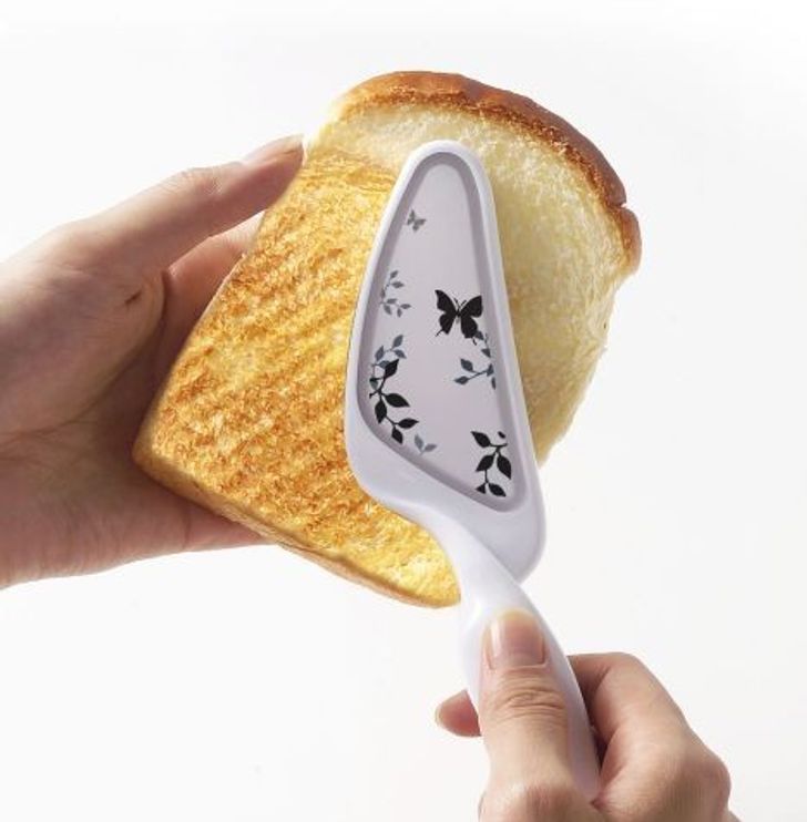 A handheld portable toaster