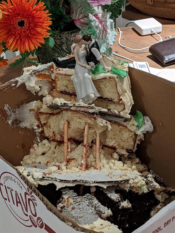 “This is how the cake arrived for my brother’s wedding tomorrow. Let me tell you, it is a perfect metaphor for how COVID has affected their plans.”