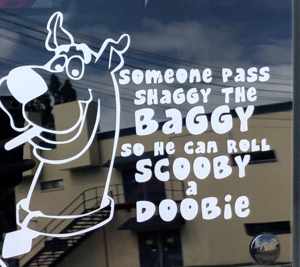 signage - someone Pass Shaggy The BaGGY So he can Roll Scooby a DOBie