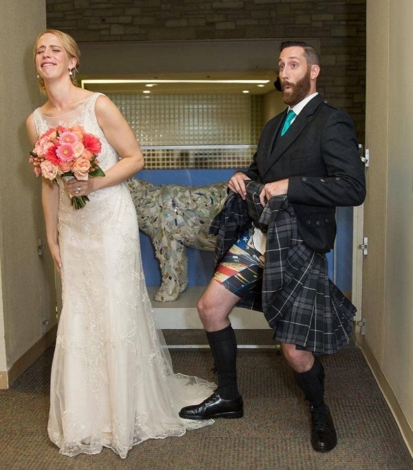 guy wearing kilt at wedding flashing his wife