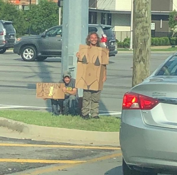 homeless guy with cardboard bikini - pimpin ain't easy