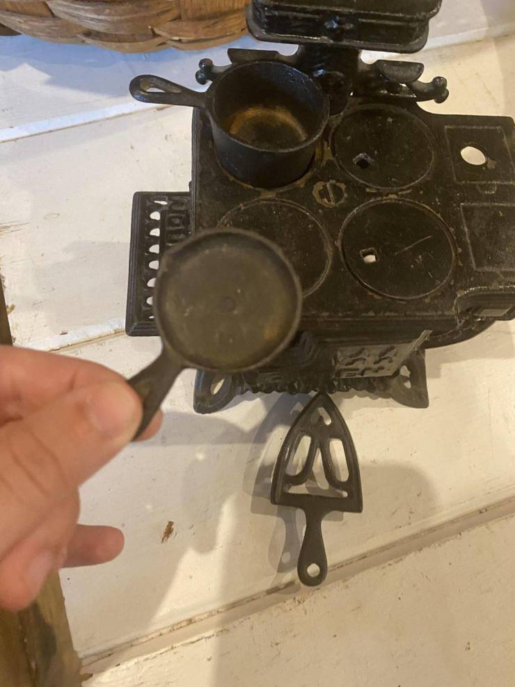 “Tiny, but usable, cast iron stove.”