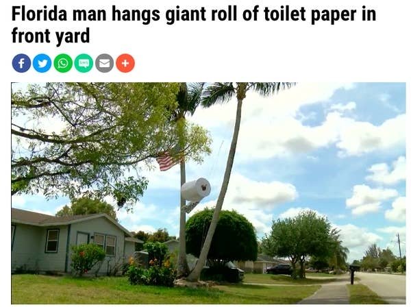 florida man hangs giant toilet paper roll - Florida man hangs giant roll of toilet paper in front yard