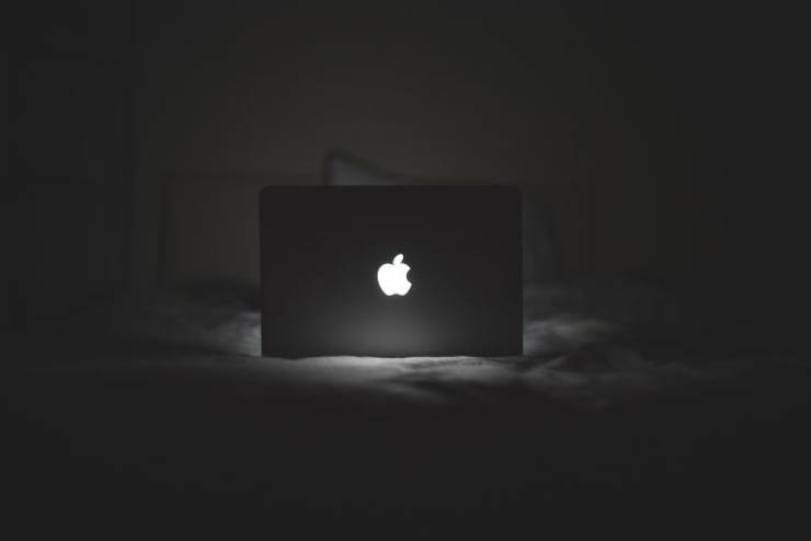 macbook in dark room