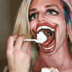 horrifying gif of person with face paint eating food
