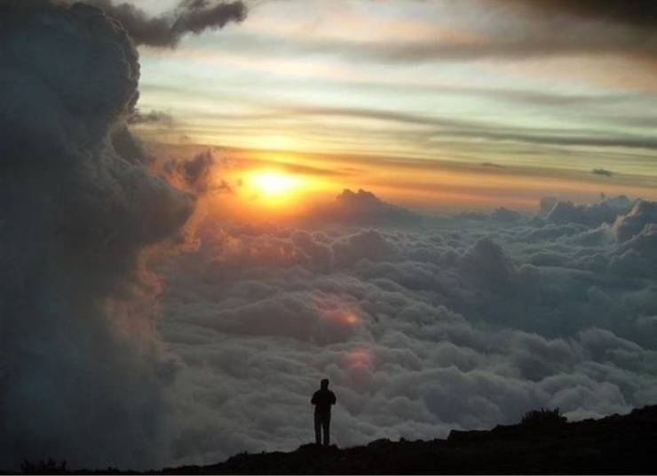 standing above the clouds