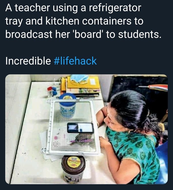 teacher using refrigerator tray - A teacher using a refrigerator tray and kitchen containers to broadcast her 'board' to students. Incredible