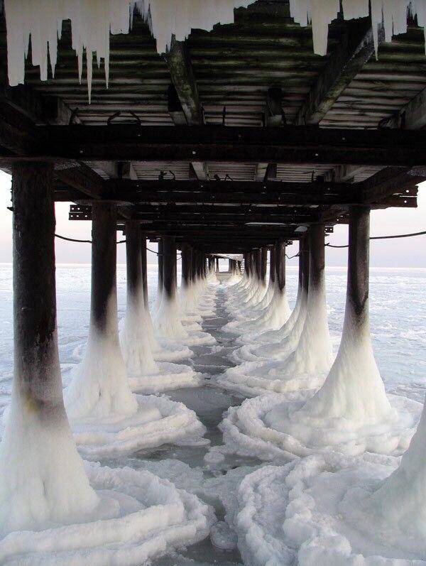 frozen water under a pier - Men. G.