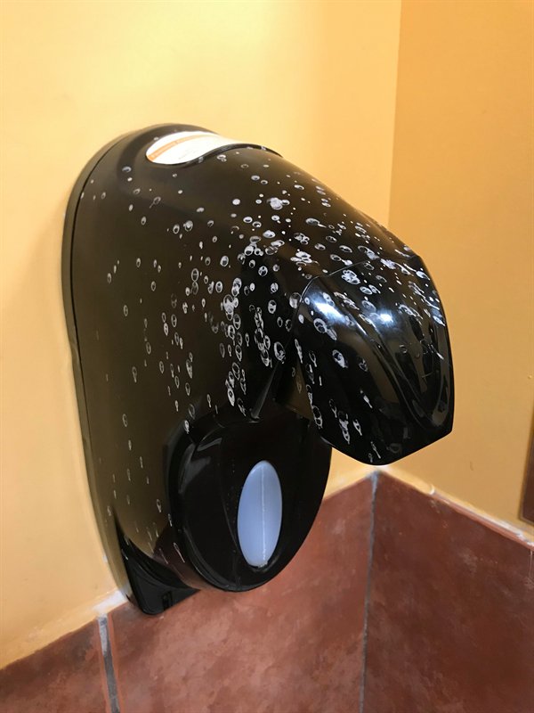 “These painted “soap bubbles” just make it look like the soap dispenser is dirty.”