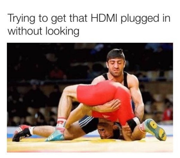 gay sports - Trying to get that Hdmi plugged in without looking