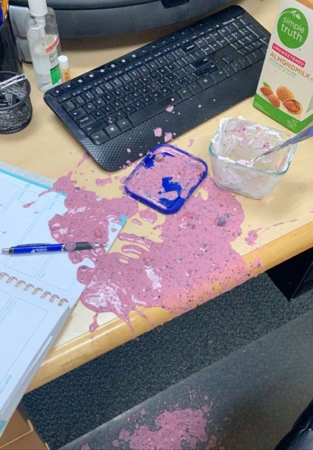 spilled yogurt on desk computer