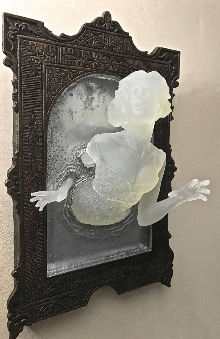 ghost in the mirror wall plaque