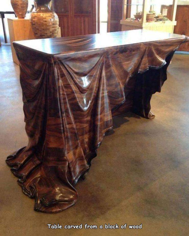 carved wood table - Table carved from a block of wood