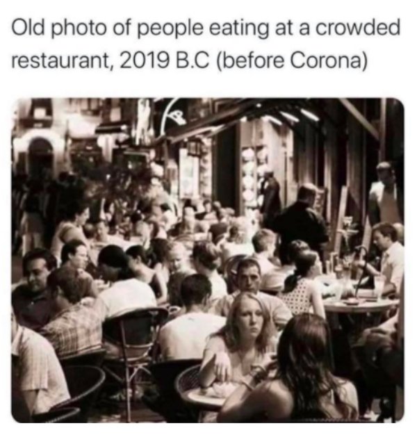 bc before covid meme - Old photo of people eating at a crowded restaurant, 2019 B.C before Corona