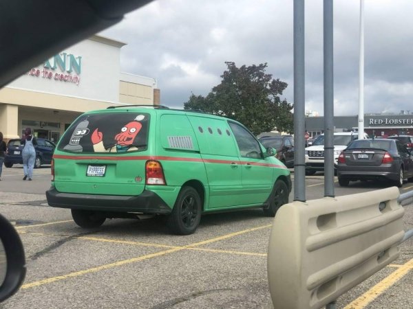 zoidberg painted on a green minivan