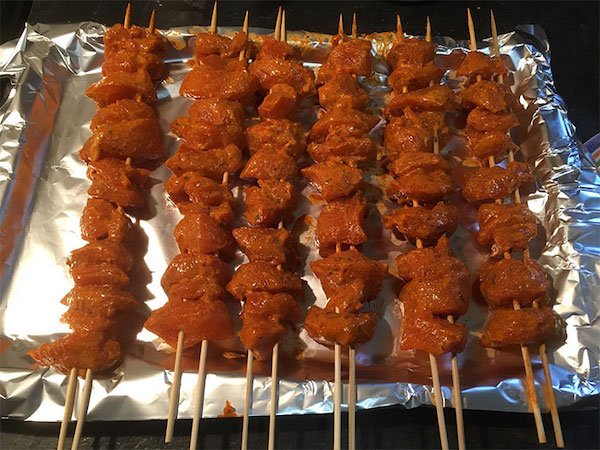 Grilling meat on a skewer? Use two skewers so they don’t turn back once you slip them