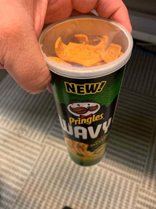 Reuse a pringles can for other snacks that come in bags to avoid crinkling in the office.