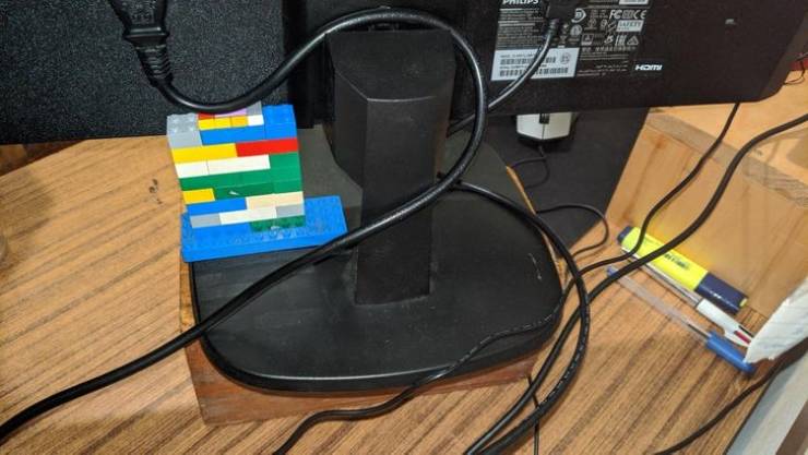 "Lego base to hold up loose power cord"