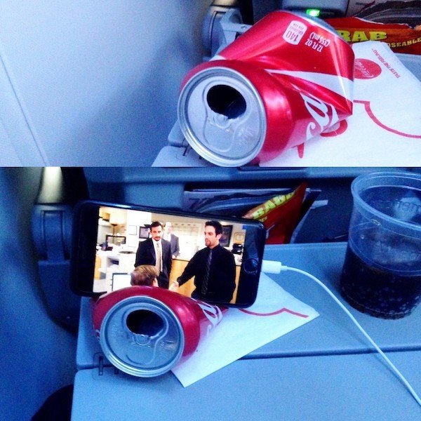 funny memes -coke can to prop up cellphone on airplane