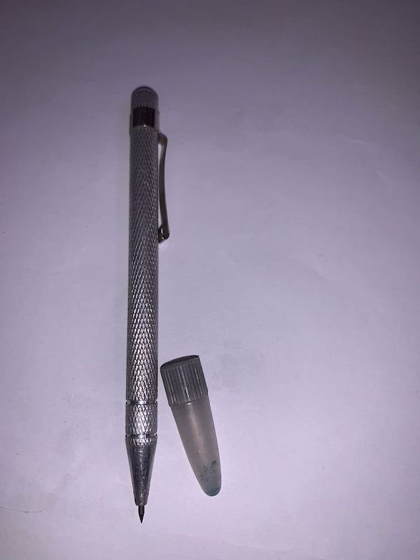 pen-shaped metal tool