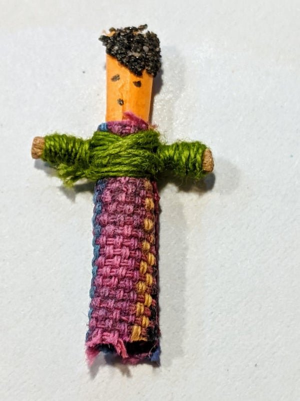 What is this 1-inch tall doll we found in our mailbox? Whatever is on its head is burnt.

<br/><br/><b>A:</b> It’s a worry doll