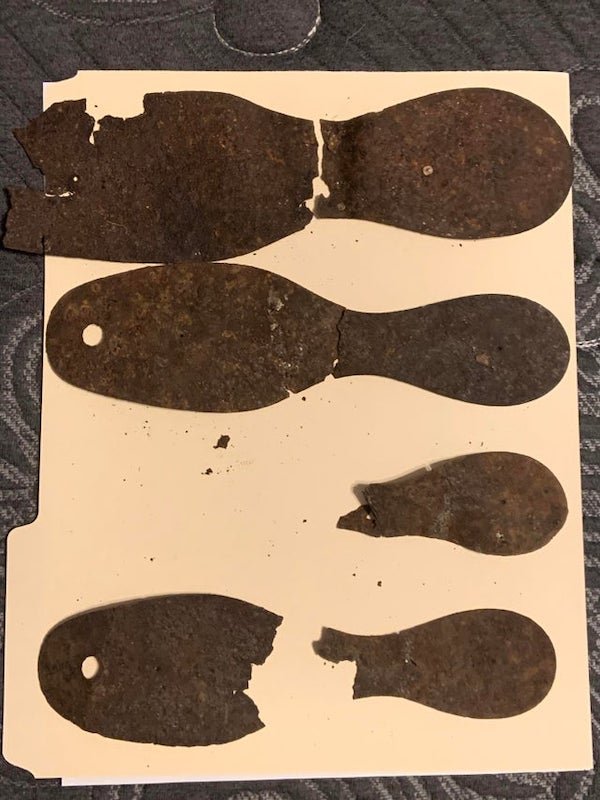 Found these metal detecting an old home site? Are these old shoes or shoe bottoms? House was mid 1800-early 1900s

<br/><br/><b>A:</b> Templates for fabric or leather.