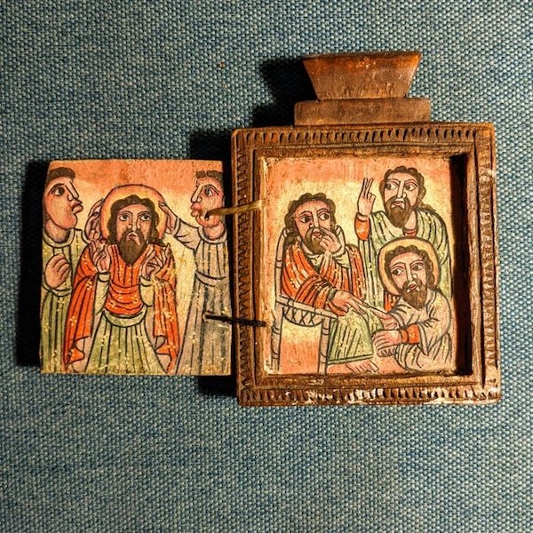 What is this strange little wooden box with flaps hiding religious pictures?

<br/><br/><b>A:</b>  It’s an icon. They’re very common in the Eastern Orthodox churches. They are a focus for prayer.