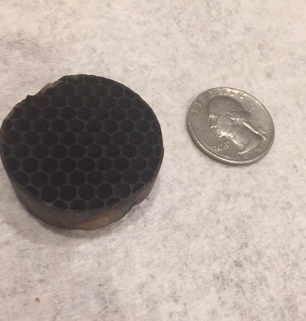 What is this metal honeycomb thing I found mixed in with my frozen cauliflower after baking it?

<br/><br/><b>A:</b> Part of your oven. It goes in the vent tube between the oven and stove top.