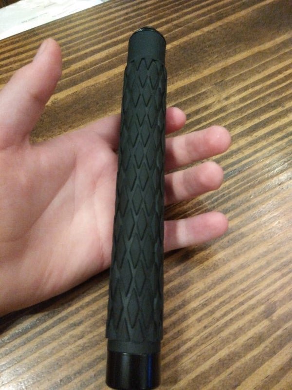 What is this thing I found while walking along the road

<br/><br/><b>A:</b> Extendable baton. Give it a nice wrist snap and it will extend out. Need to hammer that roughed up tip into the ground to close it.