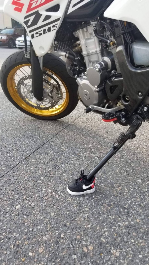 funny memes - motorcycle kickstand wearing a tiny sneaker