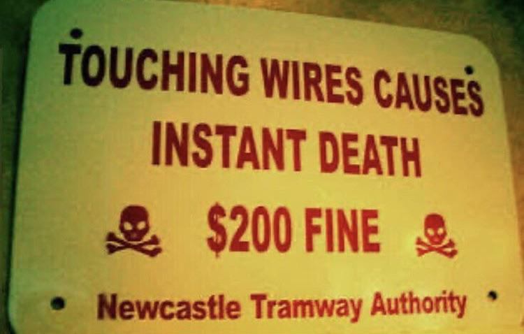 pointless signs - Touching Wires Causes Instant Death $200 Fine Newcastle Tramway Authority