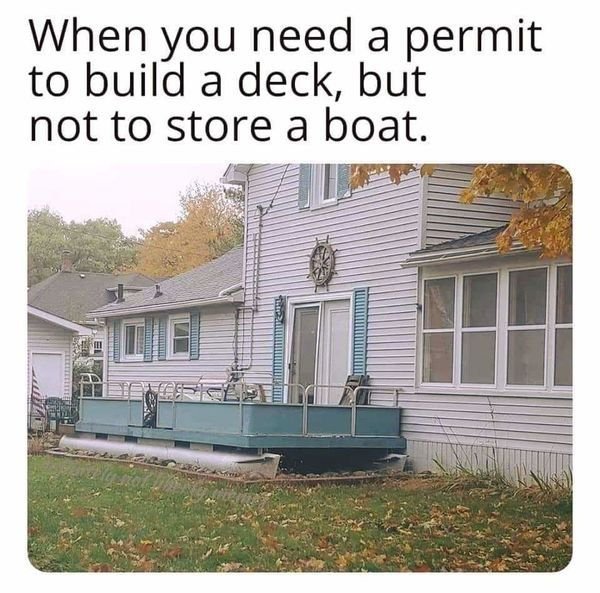 pontoon house deck - When you need a permit to build a deck, but not to store a boat.