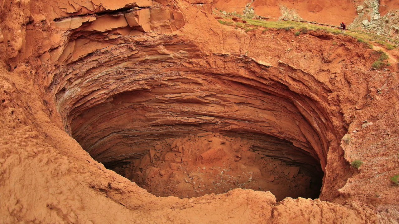 OKLAHOMA: THE MEN IN BLACK AT SHAMAN’S PORTAL.According to superstition, anyone who learns anything about what’s truly buried underneath the sand disappears.