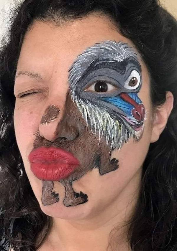 funny meme - woman with baboon drawing on face