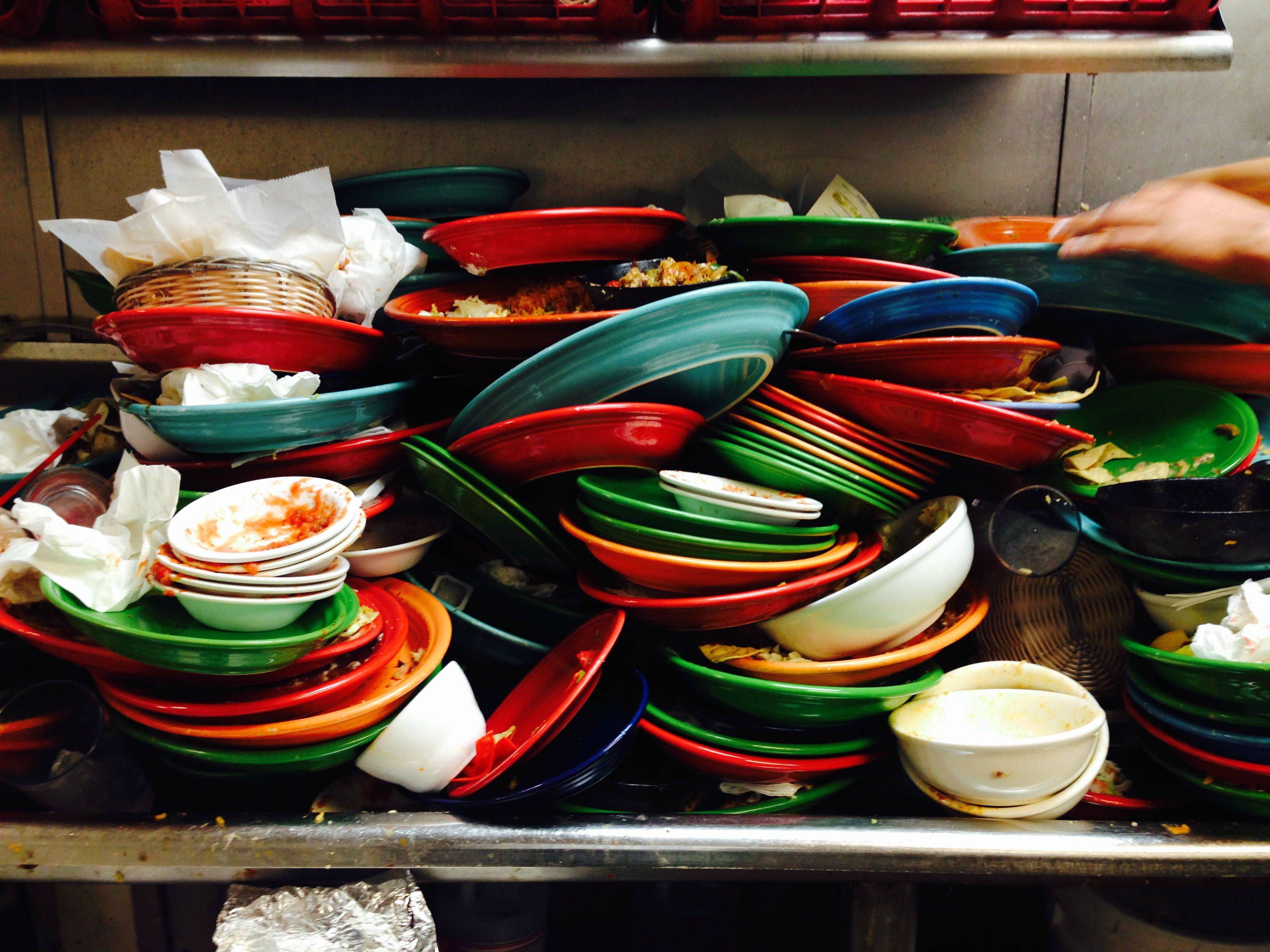 funny work stories - pile of dirty dishes