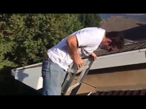 funny work stories - guy standing on a ladder