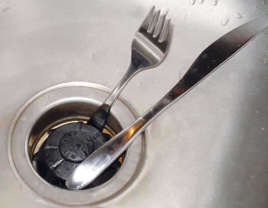 funny work stories - utensils stuck in the sink