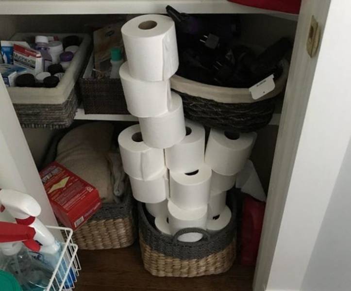 toilet paper rolls stacked too high