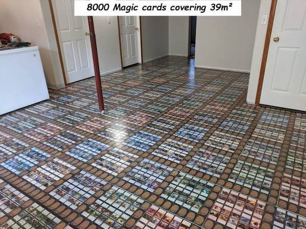 cool pictures - 8000 magic the gathering cards covering an entire floor