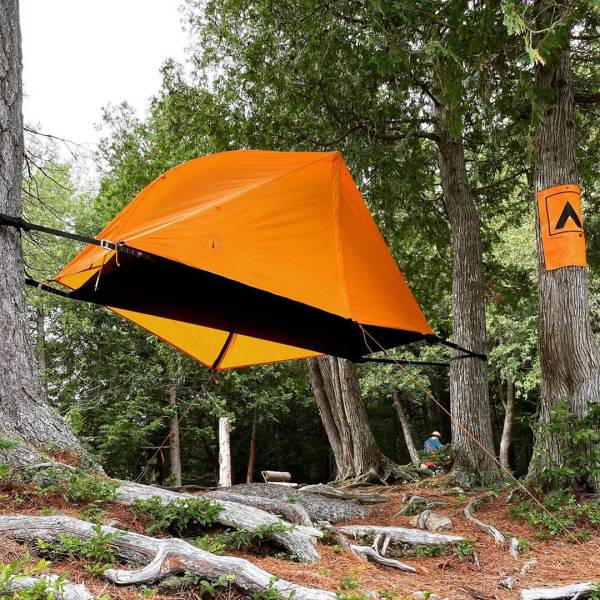 "These hammocks double as tents that protect you from animals and insects when you sleep."